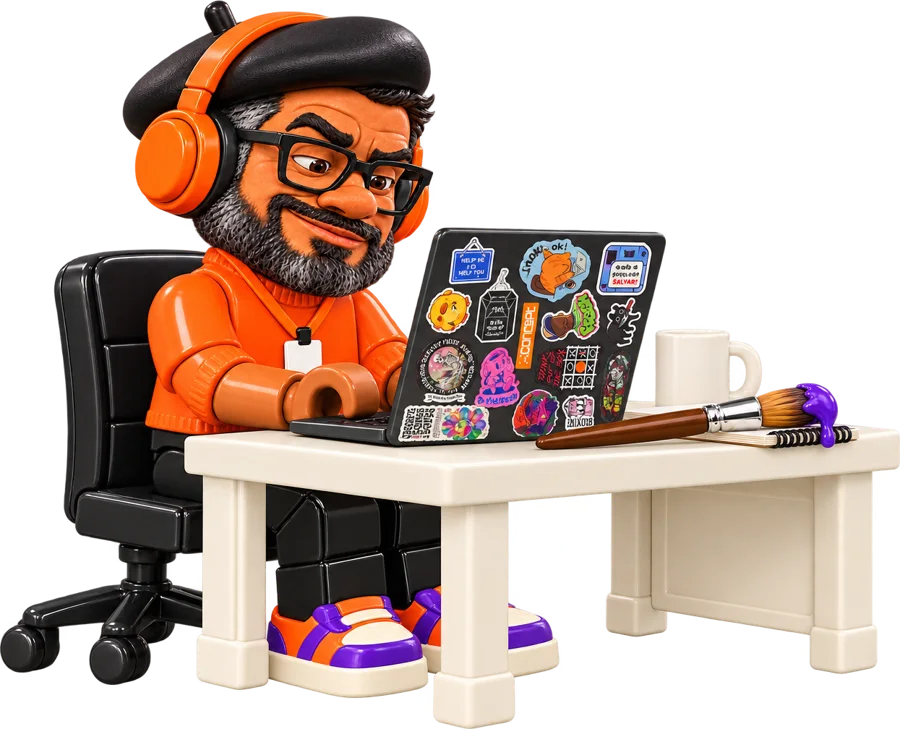 O Estagiário de boina e suéter laranja, editando no notebook cheio de adesivos